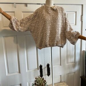 Chunky yet lightweight sweater in a creamy taupe color